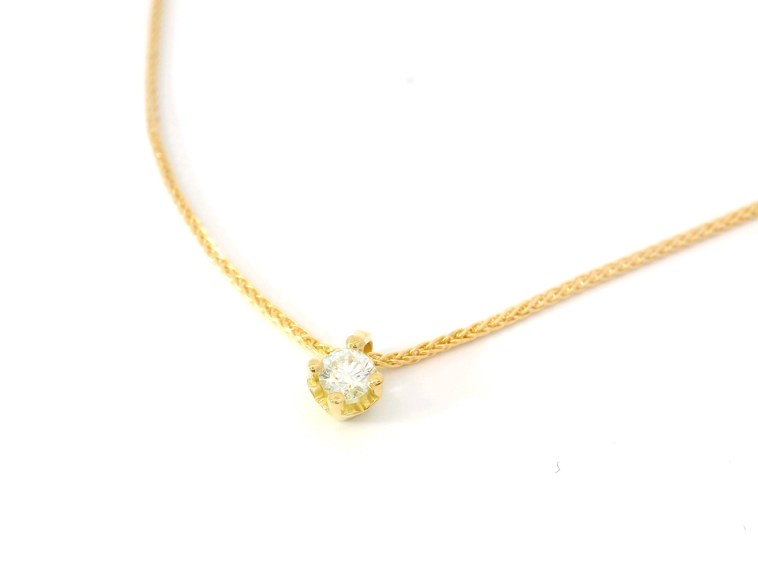 Collier solitaire cœur 0.15 ct.