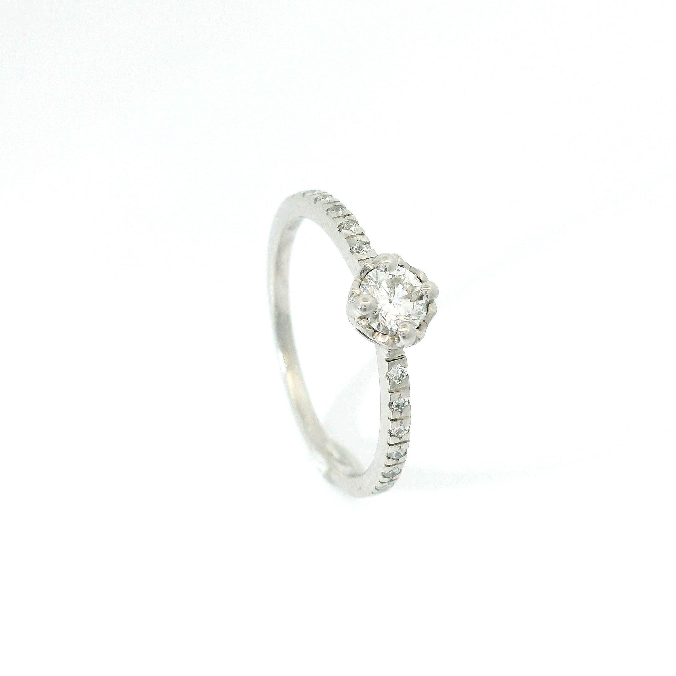 Bague solitaire cœur 0.25 ct.