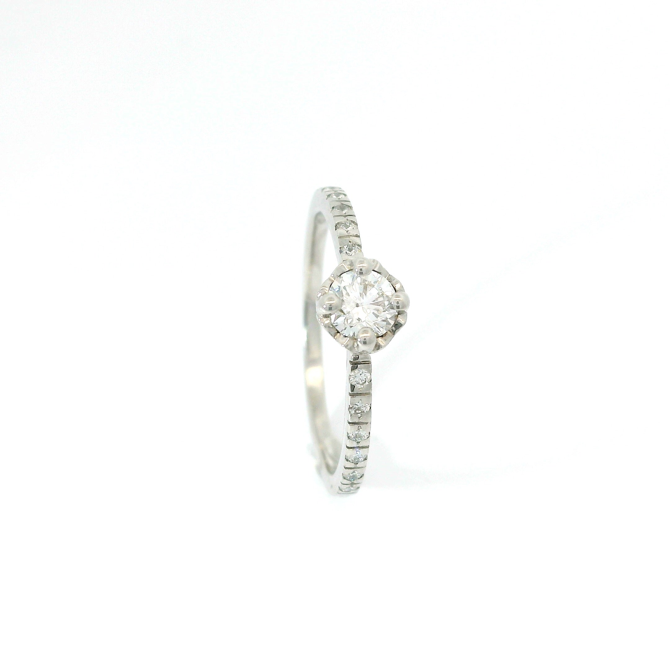 Bague solitaire cœur 0.25 ct.