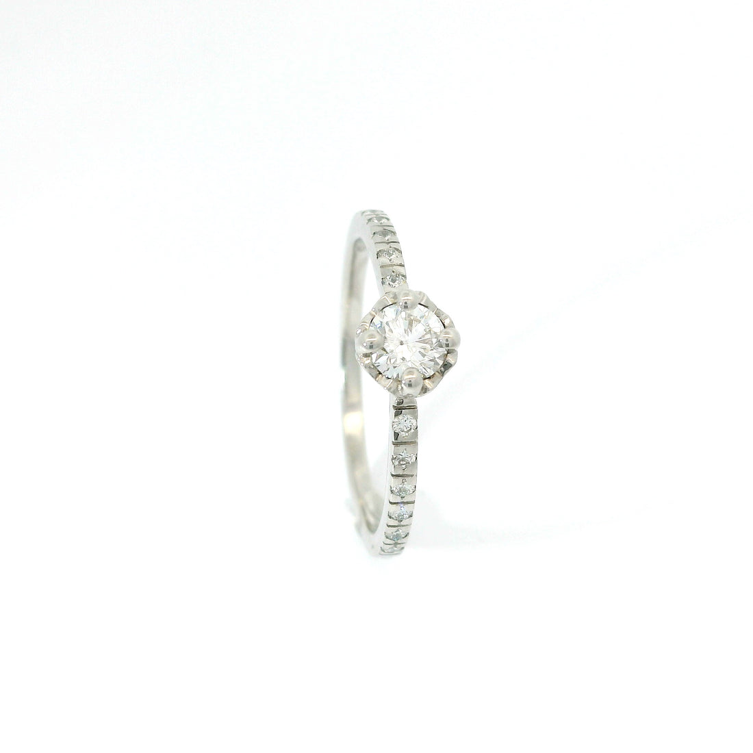 Bague solitaire cœur 0.25 ct.