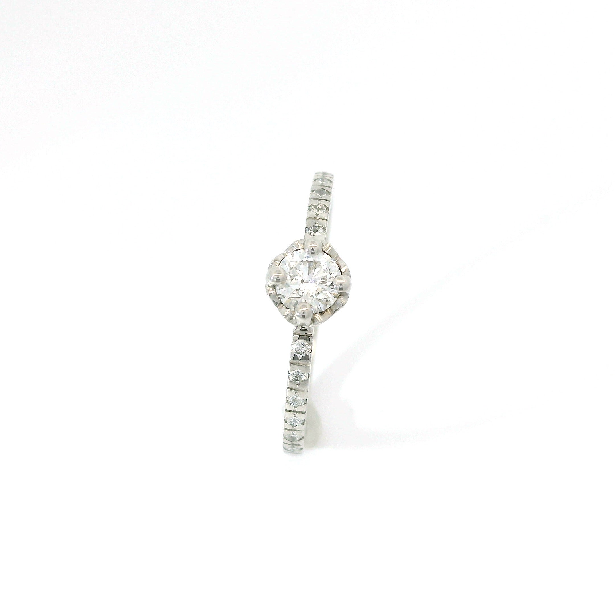 Bague solitaire cœur 0.25 ct.