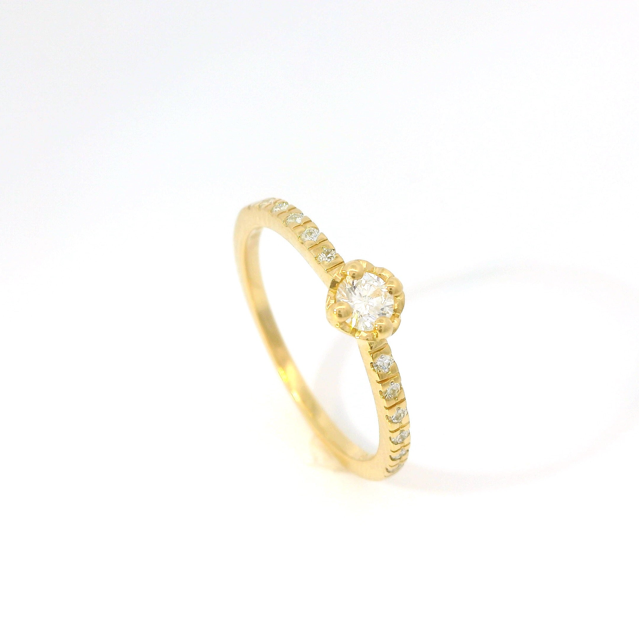 Bague solitaire cœur 0.15 ct.