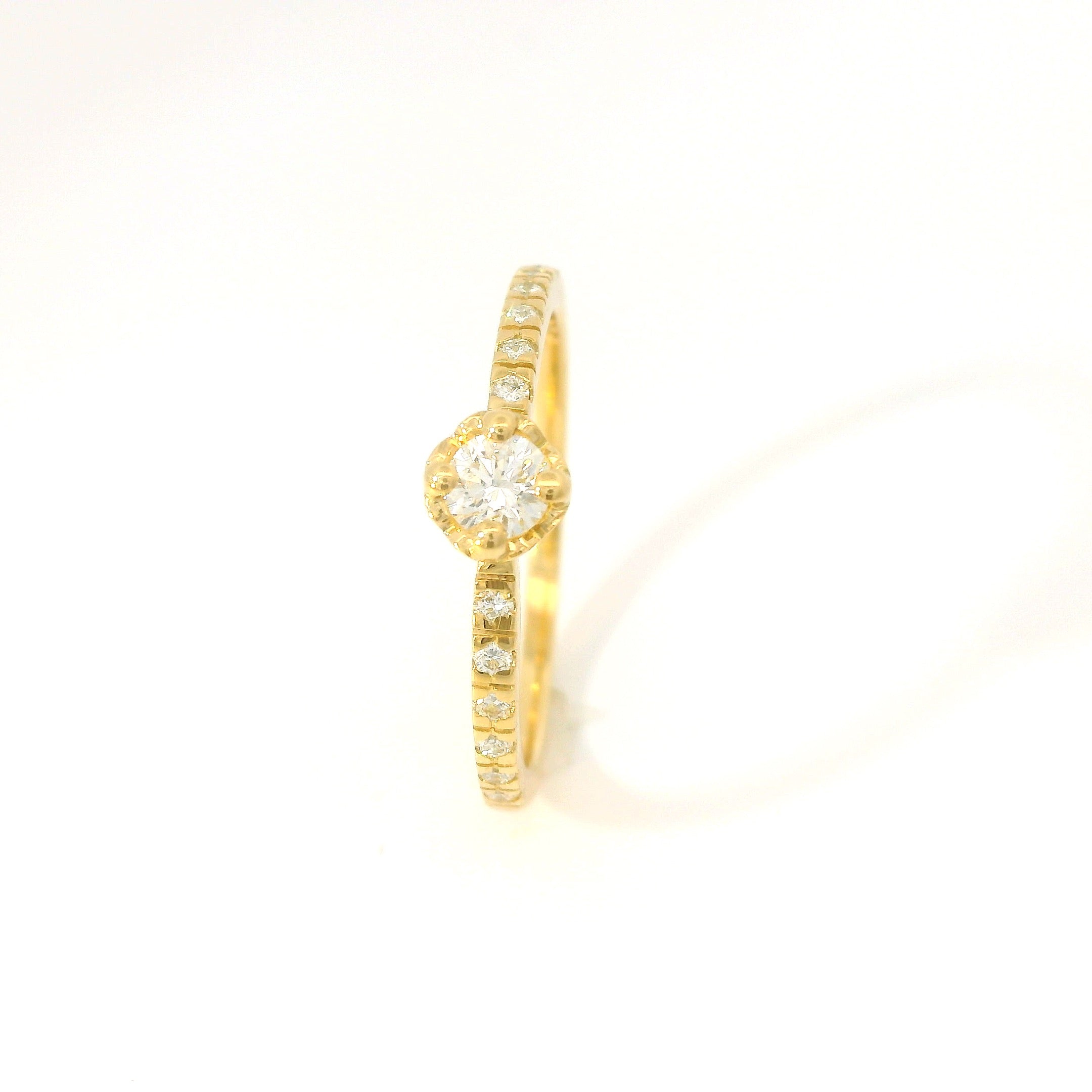 Bague solitaire cœur 0.15 ct.