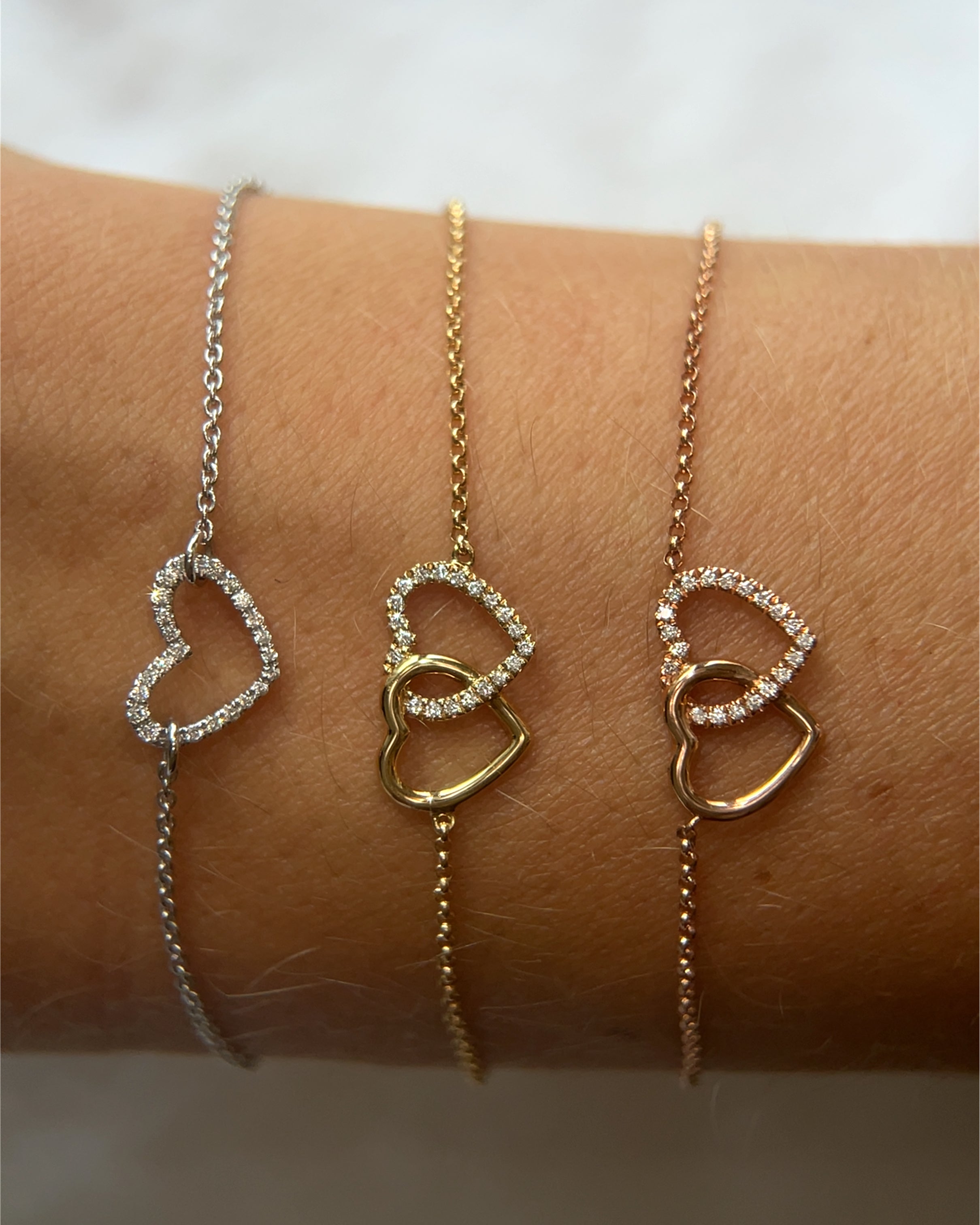 Bracelet doubles cœurs enlacés