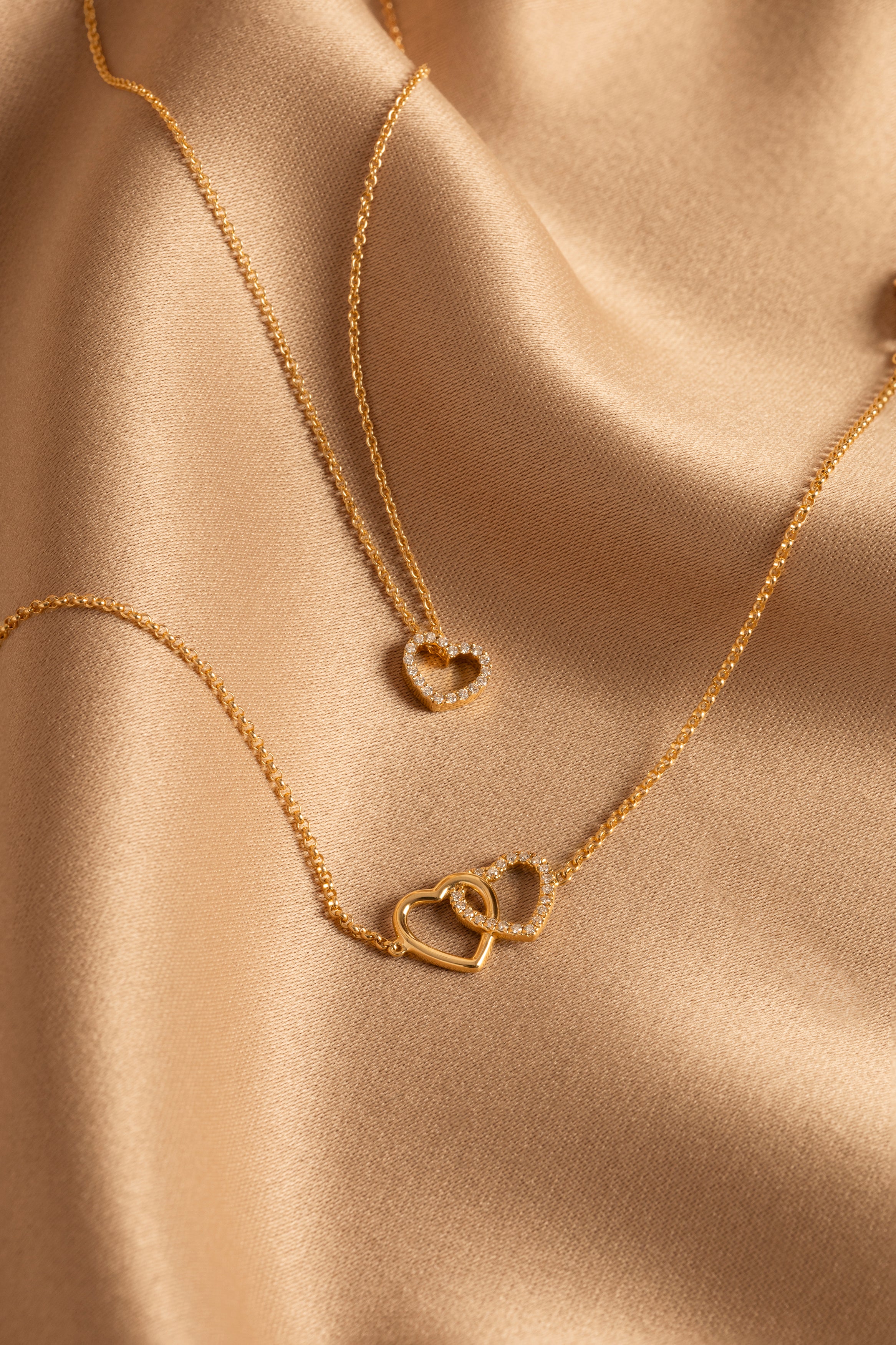 Bracelet doubles cœurs enlacés