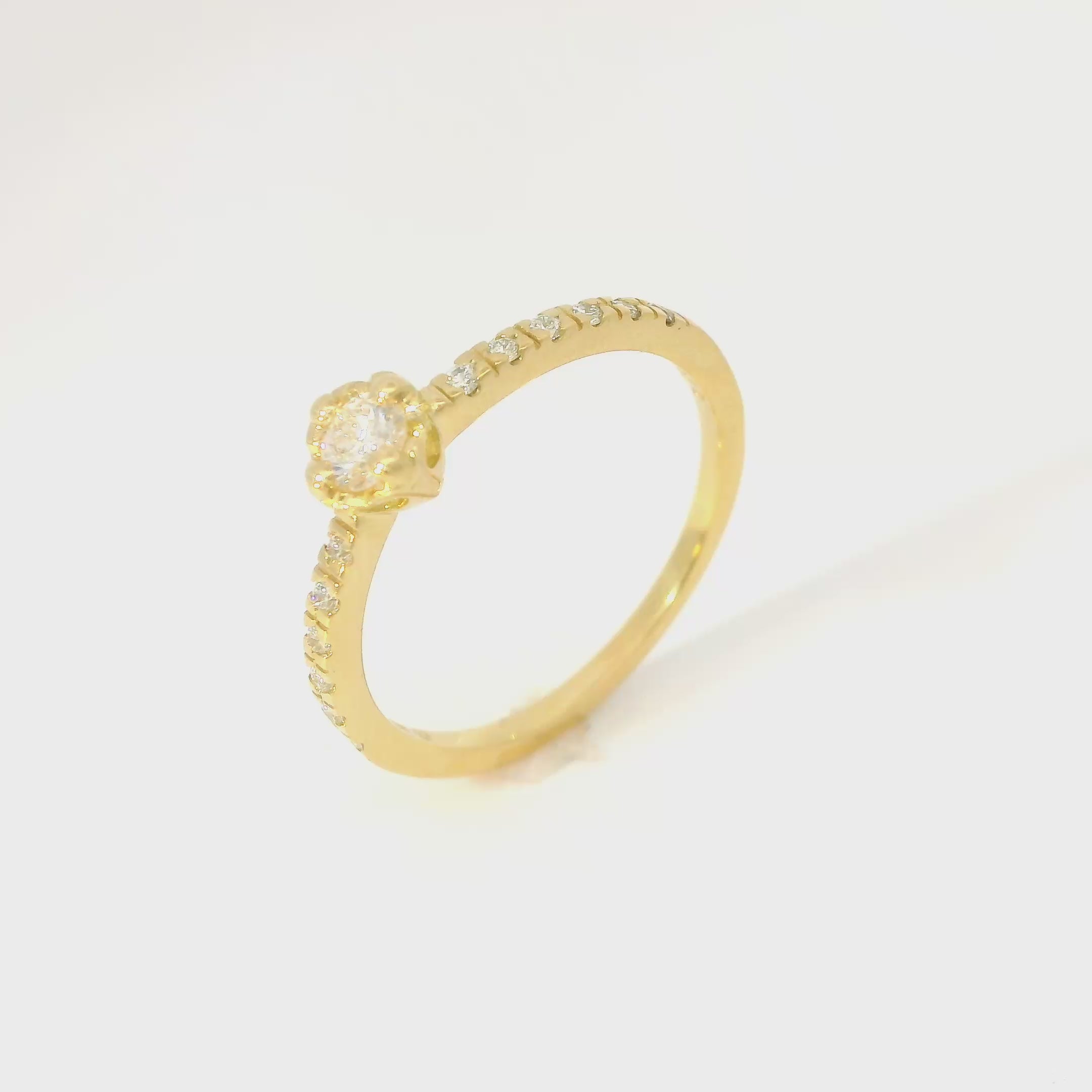 Bague solitaire cœur 0.15 ct.