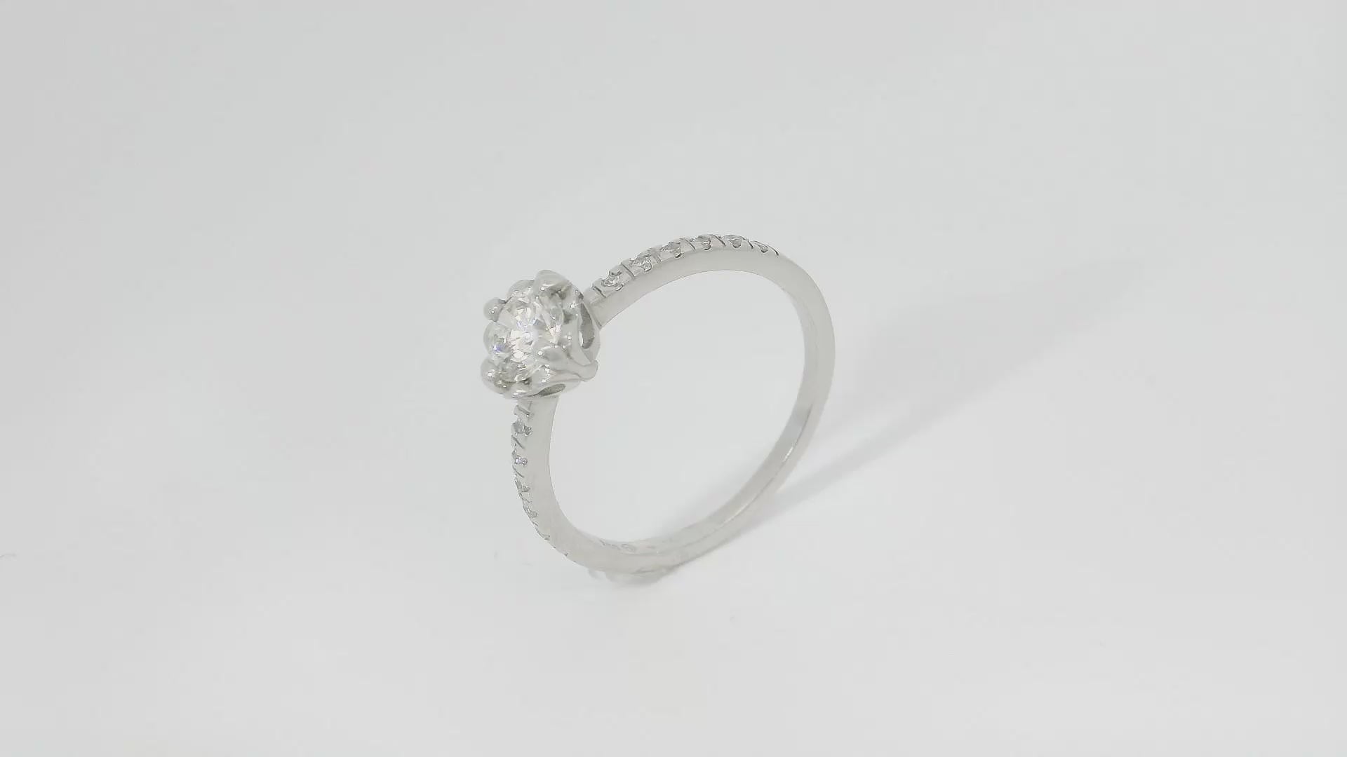Bague solitaire cœur 0.50 ct.